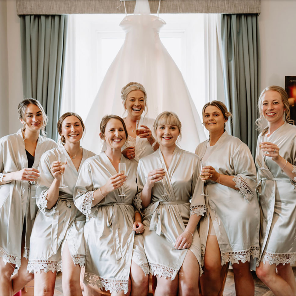 Bride in the bridal suite with her dress