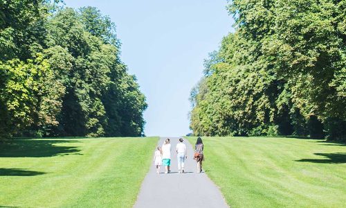 Cirencester-Park A group of 4 people walking in Cirencester Park