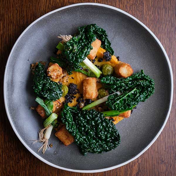 Deep fried Gnocchi, with butternut squash puree and cavolo nero