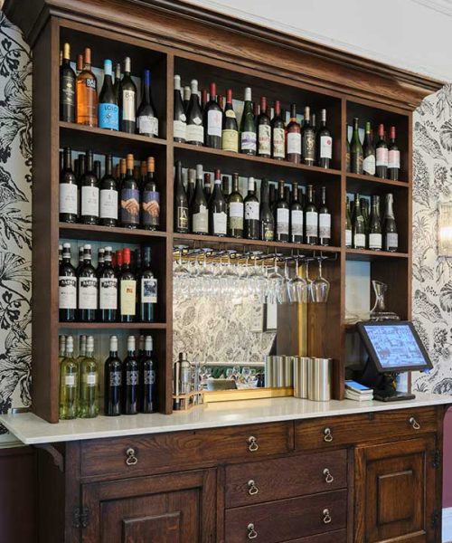 the restaurant wine wall showing selection of wines available to buy